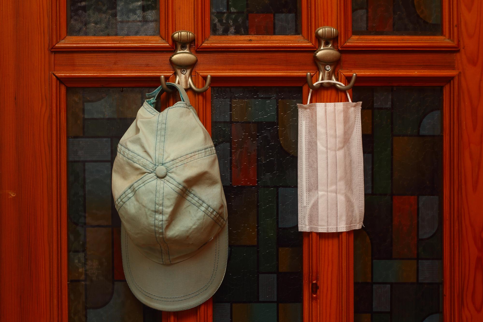atelier storefront and doorway with embroidered sign